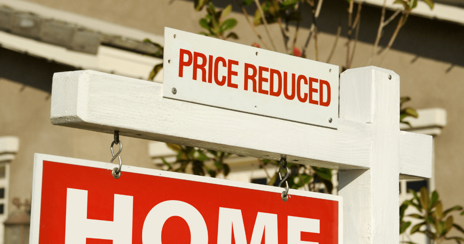 picture of a cheap house price reduction sign