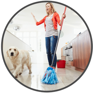picture of a woman mopping the floor with a dog